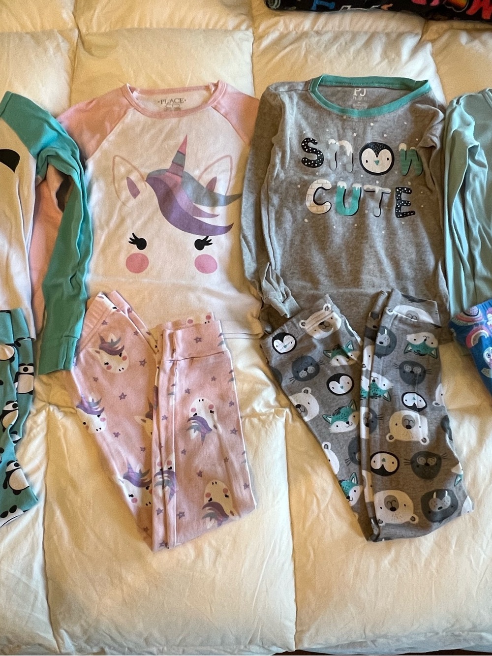 Place Pink and White Unicorn Pajama Set with Pastel Accents